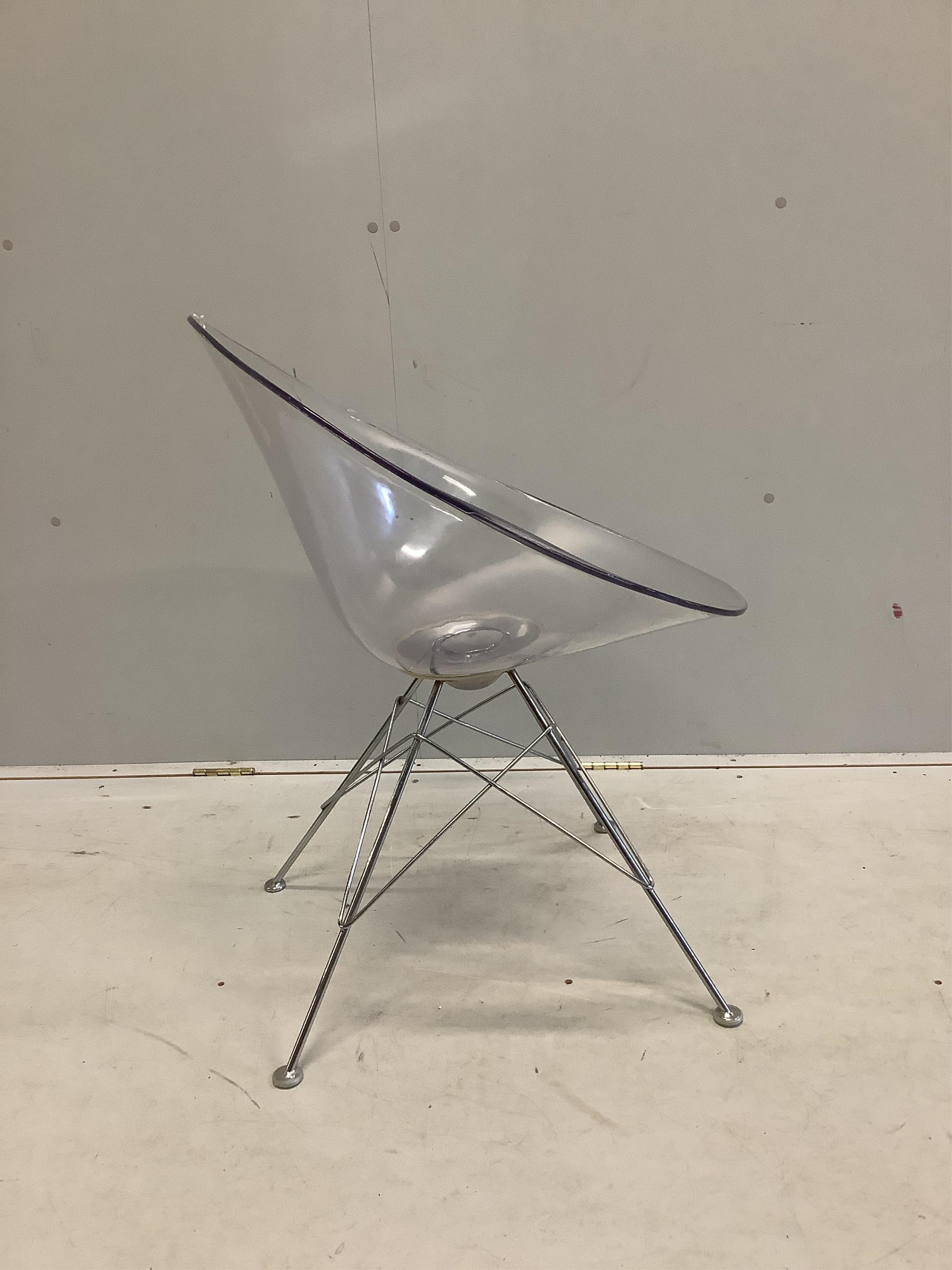 A Philip Starck style Eros transparent chair on “Eiffel Tower” base, width 61cm, depth 60cm, height 81cm. Condition - fair, minor chips and surface scratches.